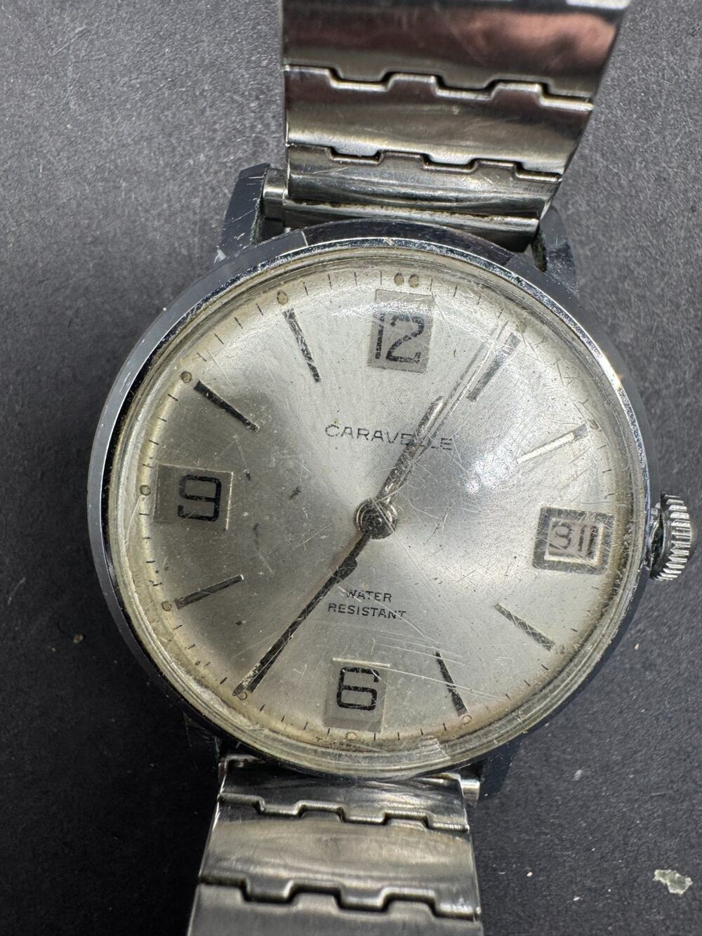 Vintage 1975 Caravelle Watch M9 Water Resistant Silver Tone 30MM Stretch Band